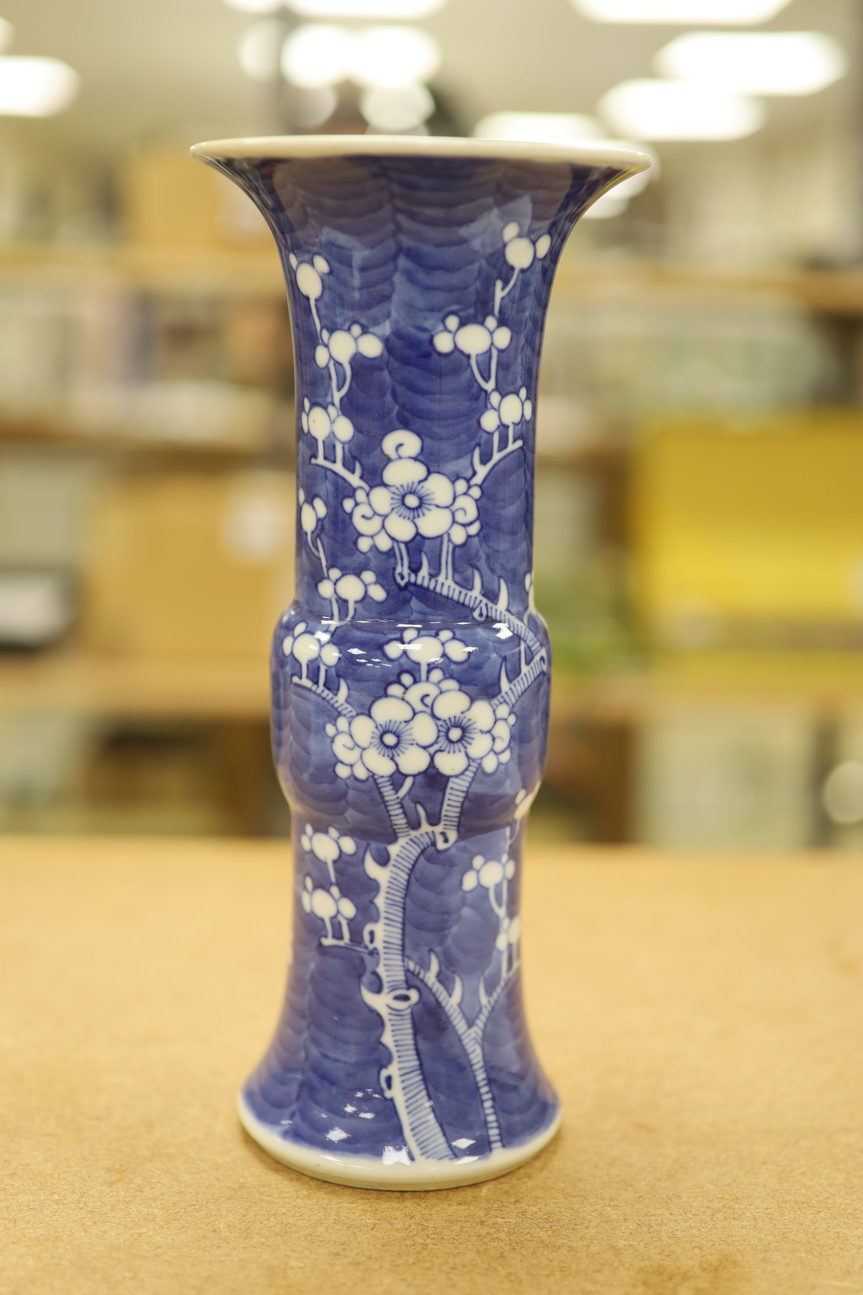A pair of late 19th century Chinese blue and white prunus vases